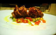 MAIN POLLO Chicken thigh stuffed with pepper,dressed with Sardinian pancetta and served with tomato concassè