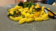 GNOCCHETTI COZZE E ASPARAGI Sardinian gnochetti pasta sautèed with mussel asparagus and Sardinian saffron